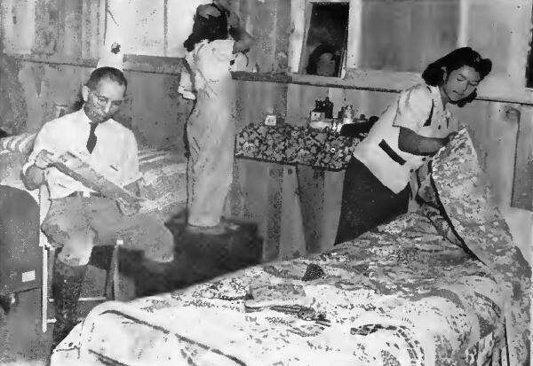 Family group in an apartment at Sacramento (California) Assembly Center