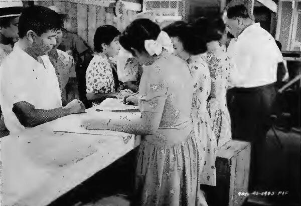 Evacuees signing up for clothing issue at Fresno (California) Assembly Center