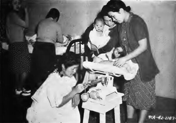 An evacuee nurse's aid at Santa Anita (California) Assembly Center